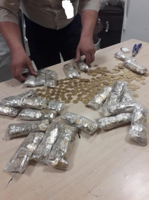 احباط تهريب 27 كيلو ذهب في مطار الملكة علياء (صور)