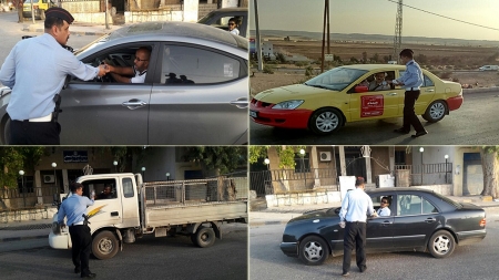 البنك الإسلامي الأردني وإدارة السير المركزية يوزعان التمر والماء على السائقين في شهر رمضان